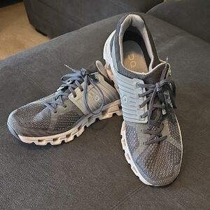 On Running Gray Athletic Shoes with Cushioned Midsole and Rugged Tread